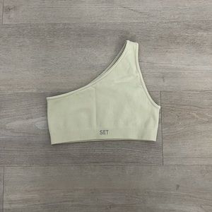 Set Active sculpt flex ribbed one shoulder. Size XS. Color Bone.